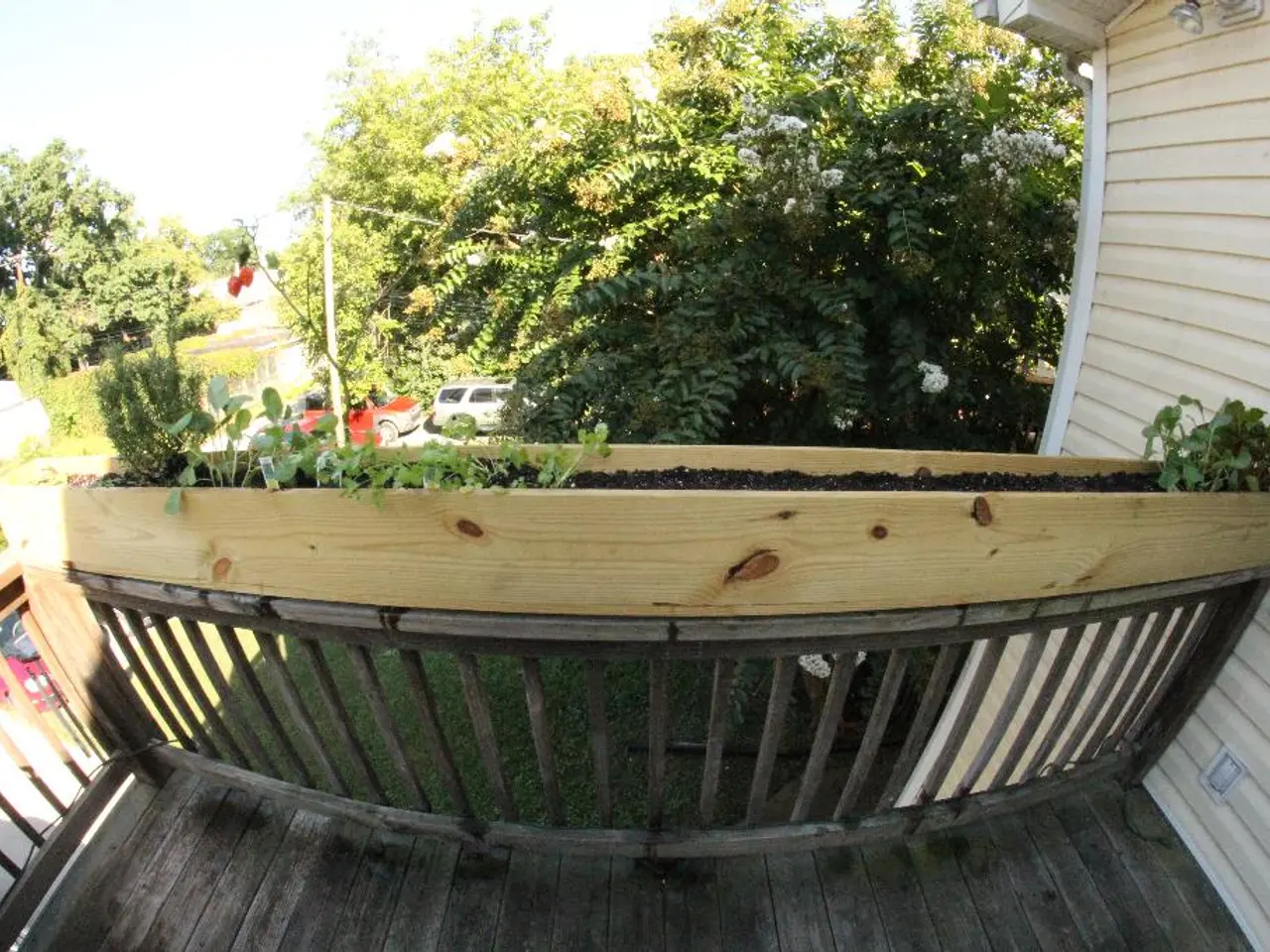 At the bottom of this image, there are planets arranged on a fence. This fence is connected to a...