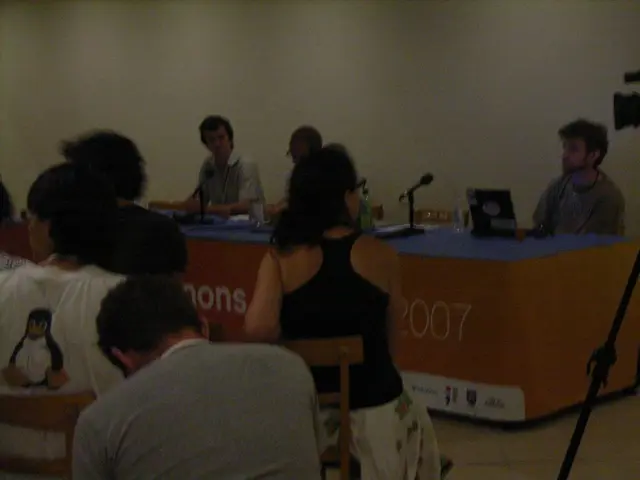 This picture describes about group of people they are all seated on the chair, in front of them we...